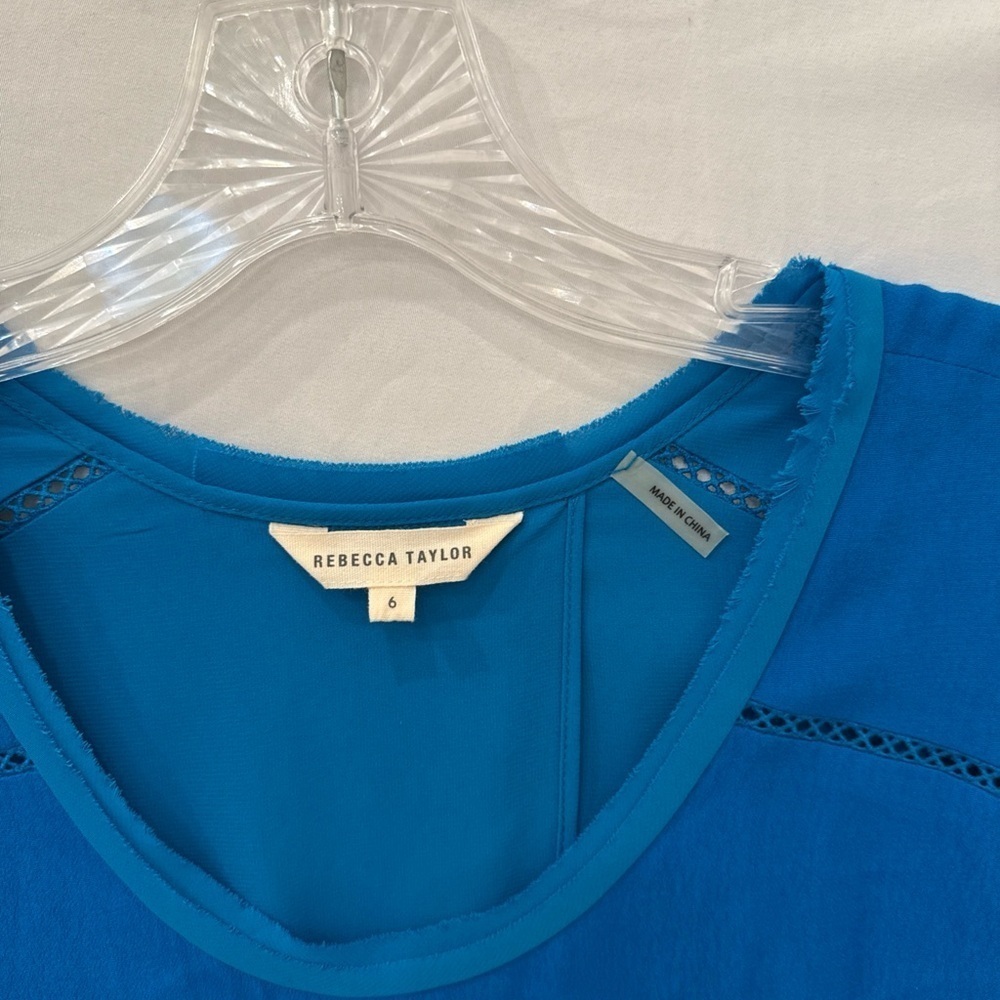 REBECCA TAYLOR Blue split back Top sz 6
Rayon poly spandex - Picture 3 of 6